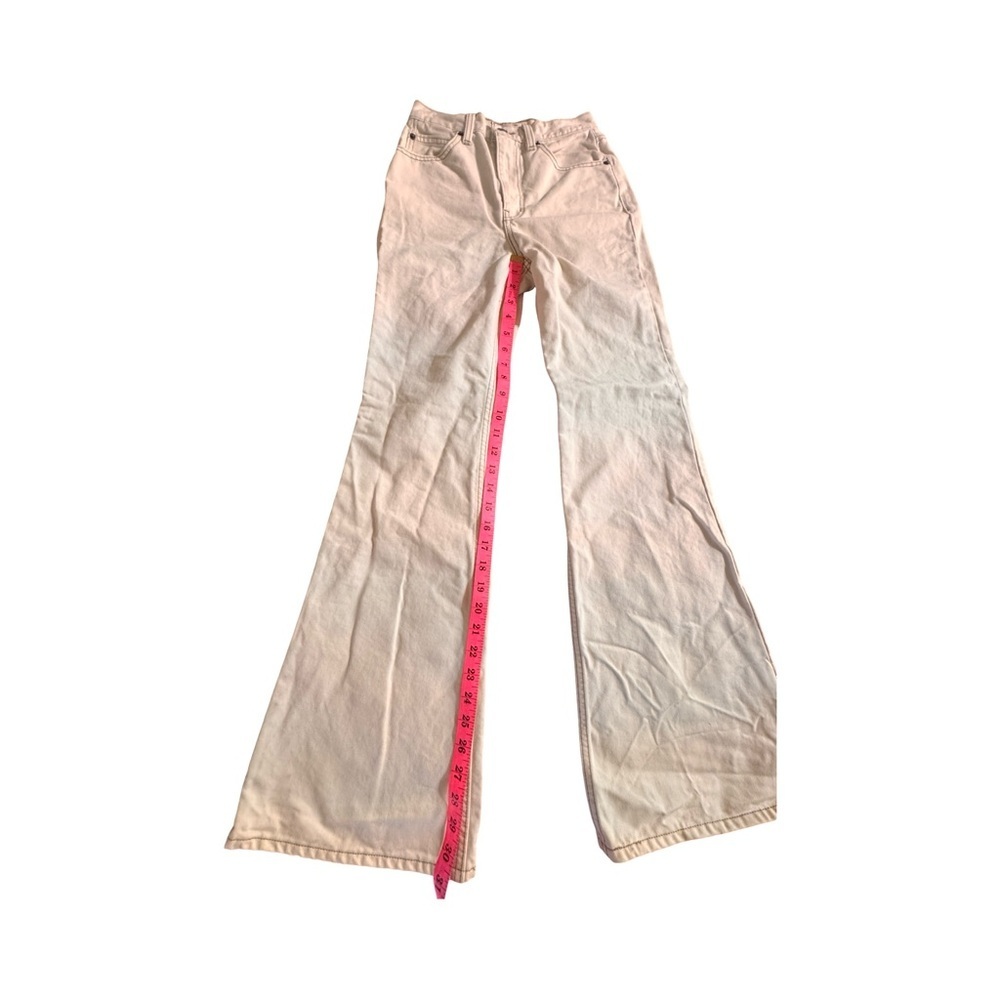 Levi’s Premium 70s Movin’ On High Rise Flare Jeans in Sunny Cream - Picture 8 of 15